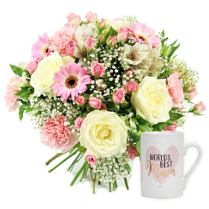 A heartfelt floral and mug gift set, perfect for a beloved mum in Stanmore, is laid out in a bright, white studio setting, the neutral backdrop allowing every petal and letter to stand out clearly. On the left, a full, round bouquet of mixed blooms sits proudly, its stems gathered and visible at the base like a freshly tied bunch just handed over at a local Stanmore doorstep. The colour scheme is gentle and elegant, dominated by soft creams, blush pinks, and brighter pink highlights. Central to the arrangement are several large cream roses, fully open and spiral-shaped, their velvety petals layered in generous curves that radiate a sense of calm devotion. Between them, bright pink gerbera daisies rise with confident, disc-shaped faces and dark centres, adding an upbeat, modern flair that contrasts beautifully with the classic roses. Delicate, ruffled pink carnations and compact clusters of darker pink spray roses are peppered throughout, building volume and a sense of overflowing affection, much like the cosy feel of family gatherings near Stanmore Hill. Fine stems of white alstroemeria, lightly flecked with reddish-brown markings, thread gracefully through the larger blooms, bringing a slender, elegant line. Tiny white baby's breath flowers scatter like starry specks across the bouquet, softening the structure and giving it a dreamy, cloud-like texture. Glimpses of green foliage peek through just enough to keep the design lively and fresh. To the right of the bouquet, a pristine white ceramic mug is neatly positioned. Its front bears a soft, watercolour-style pink heart with the words World's Best Mum inside. World's Best appears in understated dark lettering, while Mum is highlighted in a shimmering gold or rose-gold script, catching the eye and echoing the warmth of the flowers. Together, the bouquet and mug create an image of love and appreciation, ideal for delivery across Stanmore on Mother's Day, birthdays, or any day a mum deserves a little extra kindness.