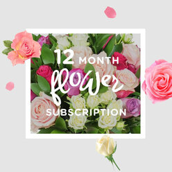 A rich, dome-shaped cluster of roses dominates the image, crafted to evoke the pleasure of receiving flowers not just once, but every month for a full year in Stanmore. The central bouquet is composed entirely of roses, each carefully placed so no single colour overwhelms the rest. Soft, blush pink roses mingle with creamy white and ivory blooms, while notes of lilac and deeper magenta add romance and depth. Some blossoms are open and expansive, revealing layers of satiny petals spiralling towards the centre, while others remain half-closed, their promise still tucked safely inside. The flowers are anchored by abundant green foliage, its smooth, substantial leaves forming a protective cradle, much like the sheltering trees along The Broadway or in Bernays Gardens. The light in the image is diffused and flattering, bathing the arrangement in a gentle glow that enhances the natural textures-the velvety softness of petals, the crisp firmness of newly cut stems, and the subtle sheen on each leaf. Around the main bouquet, individual petals and miniature blooms appear to float, framing the flowers against a pale, creamy background. This surrounding detail resembles scattered confetti and suggests the unfolding of time, like turning the page on each new month's delivery. The imagined scent is that of fresh roses-a blend of sweetness, mild spice, and green notes-that might drift through a hallway in HA7 after a delivery from Flowers Stanmore. The overall impression is of classic beauty and reliability, suitable for any-occasion gifting, from birthdays and anniversaries to thinking of you gestures that stretch gracefully across the year.