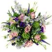 The image shows a rich, circular bouquet photographed from above against a spotless white background, its harmonious blend of pink, purple, and green capturing the feel of an elegant gift arranged by a skilled Stanmore florist. At the centre, generous roses in dusty pink and soft mauve are fully open, their rounded heads made of tightly layered petals that spiral outward with velvety softness, giving the arrangement a romantic anchor. Between these roses, delicate lavender asters with bright yellow centres cluster in gentle sprays, their fine, radiating petals introducing a light, airy texture that dances atop the denser blooms. Deep purple and indigo lisianthus blossoms are tucked into the gaps, their ruffled, bell-shaped flowers adding depth and a sophisticated, almost nocturnal richness to the palette. Rising subtly above the main blooms, slender spikes of vibrant purple veronica create vertical accents, adding a touch of wild, garden-like movement that could evoke a stroll through the green stretches around Stanmore. Punctuating the bouquet are small, spherical tufts of vivid chartreuse green, reminiscent of Green Trick dianthus, whose fuzzy, moss-like texture adds playful contrast and a modern twist to the otherwise classic mix. Silvery-green eucalyptus leaves loop through the bouquet in soft arcs, their cool, matte surfaces calming the brighter colours and suggesting a gentle, clean fragrance. Additional foliage and tight buds complete the outer edge, giving the bouquet a full, abundant profile. The composition feels joyful, refined, and versatile, suitable for celebrating a special birthday, sending congratulations, or offering a heartfelt thank-you with local flower delivery throughout Stanmore.