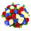 A striking bouquet of roses in a patriotic trio of deep red, clean white, and vivid cobalt blue fills the frame, its blooms clustered so closely that they form a smooth, rounded dome. Around three dozen roses are arranged with meticulous care, each blossom fully open and showcasing layers of velvety petals that spiral outward from the centre. The colours are evenly spread throughout the bouquet, with red, white, and blue roses appearing in a balanced pattern that guides the eye gently across the arrangement. Just beneath the flowers, hints of dark, glossy green foliage appear in small pockets, adding depth and a refreshing contrast that suggests freshly cut stems and attentive conditioning. The bouquet is photographed against a stark white background, under bright, even lighting that sharpens every detail and makes the colours appear especially bold and saturated. For a florist working in Stanmore, this design conjures images of local celebrations-perhaps proudly displayed at a patriotic gathering in a home near Stanmore station, used as a focal point at a community event, or delivered as a thoughtful tribute to someone who has given dedicated service. Though the photo does not convey scent, the lushness of the blooms hints at a soft, classic rose fragrance, and the visual texture evokes the sensation of brushing your fingers over the smooth, cool petals. Overall, the bouquet radiates a sense of honour and joy, combining formal structure with rich colour to create a floral statement that feels both meaningful and uplifting.